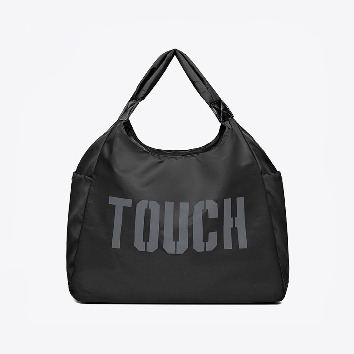 Flat lay of Touch Nylon Weekend Bag in black, great for everyday carry and travel.