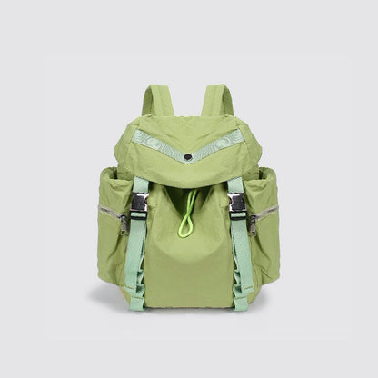 Close-up of Ultralight Urban Daily Backpack in green, vibrant outdoor gear.
