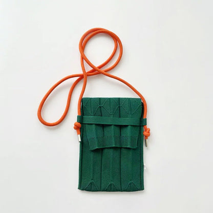 Front view of Vivid Knit Pleat Mini Bag in green, easy for commuting and weekends.