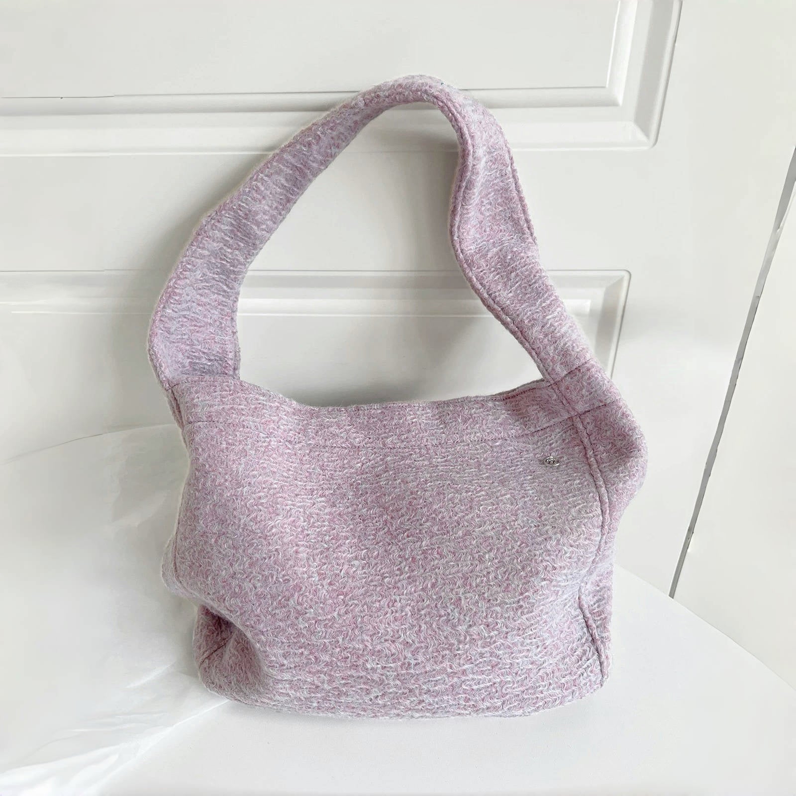 Close-up of Woolish Cozy Tote Bag with a textured finish in light purple.