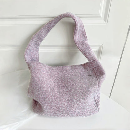 Close-up of Woolish Cozy Tote Bag with a textured finish in light purple.