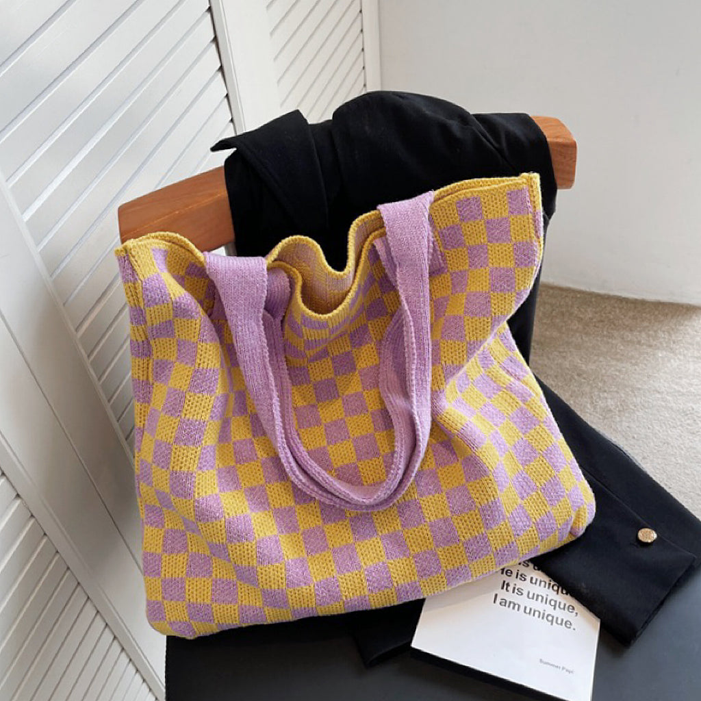 Yellow and purple checkered crochet tote bag, offering a vibrant contrast for casual days.